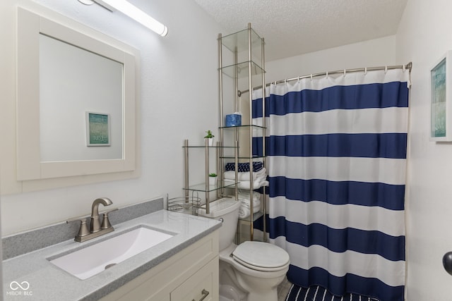 full bathroom with toilet, a textured ceiling, curtained shower, and vanity