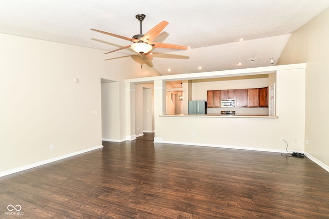 6479 Enclave Blvd, Greenwood, IN 46143 - unfurnished living room featuring a ceiling fan, dark wood-style floors, recessed lighting, baseboards, and lofted ceiling