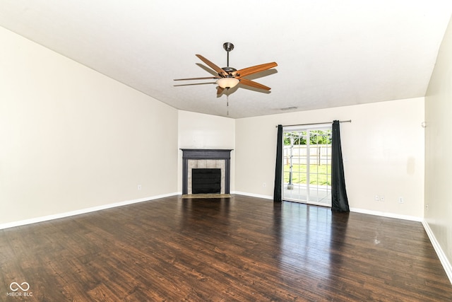 6479 Enclave Blvd, Greenwood, IN 46143 - unfurnished living room with a ceiling fan, wood finished floors, a fireplace, baseboards, and lofted ceiling