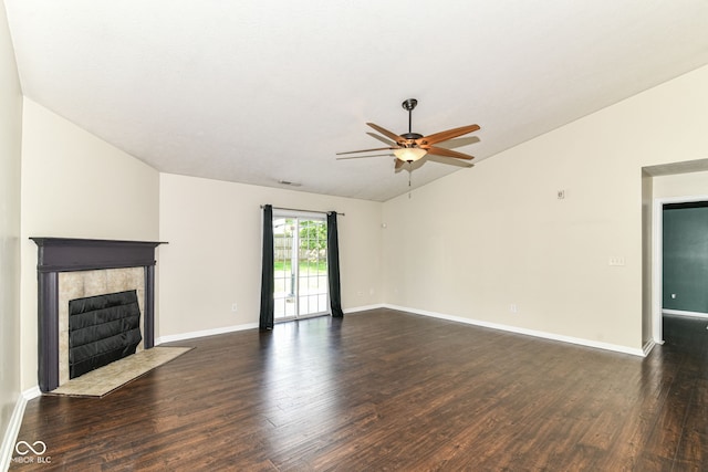 6479 Enclave Blvd, Greenwood, IN 46143 - unfurnished living room featuring vaulted ceiling, a ceiling fan, a tile fireplace, dark wood-style flooring, and baseboards
