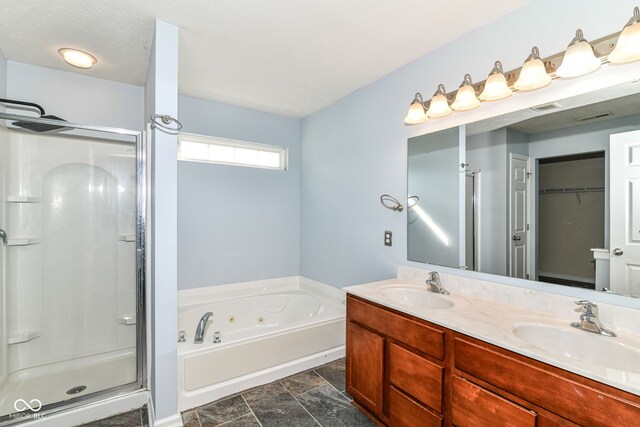 6479 Enclave Blvd, Greenwood, IN 46143 - full bath with a shower stall, a jetted tub, double vanity, and stone finish flooring