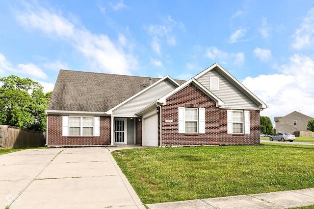 6479 Enclave Blvd, Greenwood, IN 46143 - view of front of house featuring brick siding, a garage, driveway, and roof with shingles