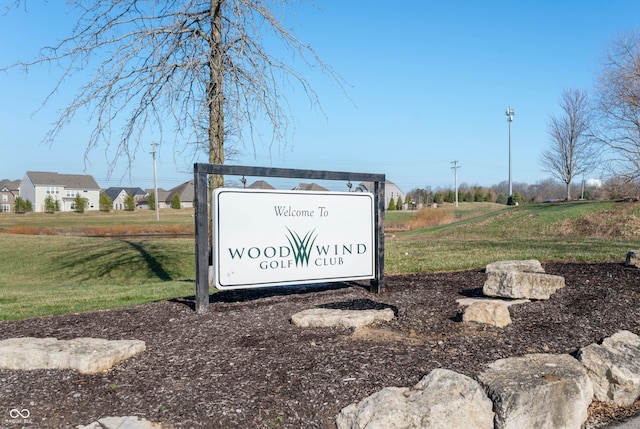 community sign with a yard