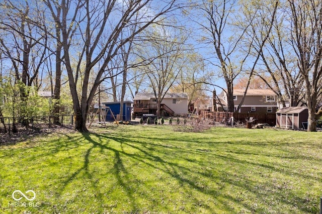 315 Heritage Ct, Fishers, IN 46038 - view of yard with fence, an outdoor structure, and a storage shed