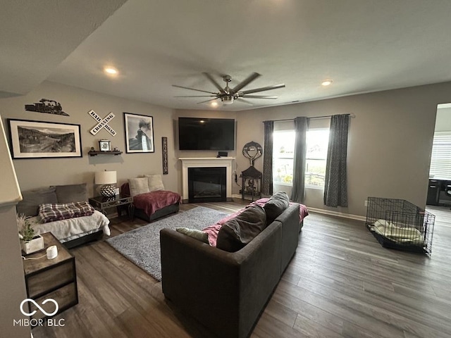 1573 Vera Blvd, Danville, IN 46122 - living room with recessed lighting, a ceiling fan, wood finished floors, and a glass covered fireplace