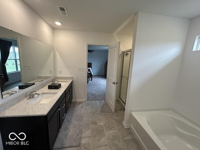 1573 Vera Blvd, Danville, IN 46122 - ensuite bathroom with a bath, a sink, visible vents, and ensuite bath