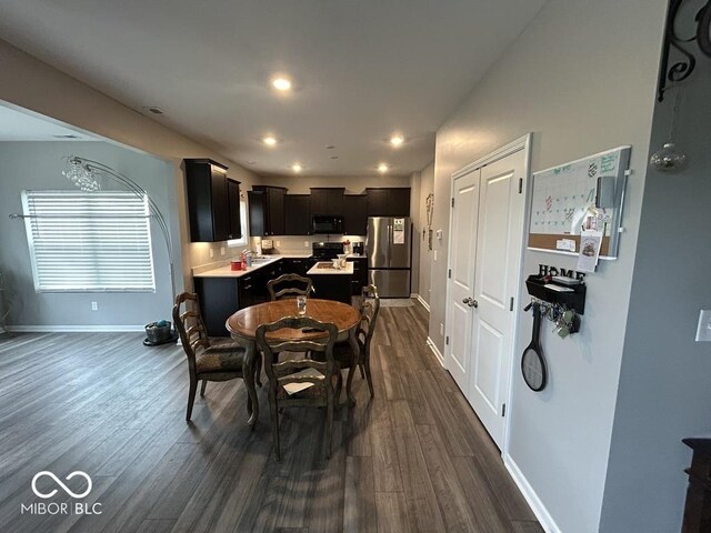 1573 Vera Blvd, Danville, IN 46122 - dining room with baseboards, dark wood finished floors, and recessed lighting