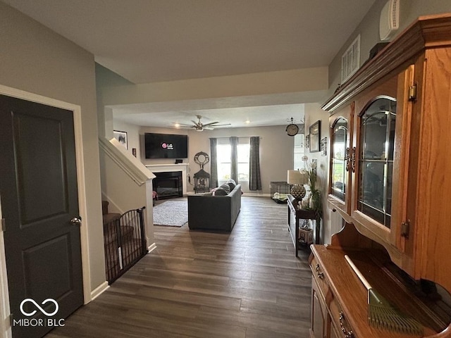 1573 Vera Blvd, Danville, IN 46122 - corridor featuring baseboards, dark wood finished floors, and visible vents