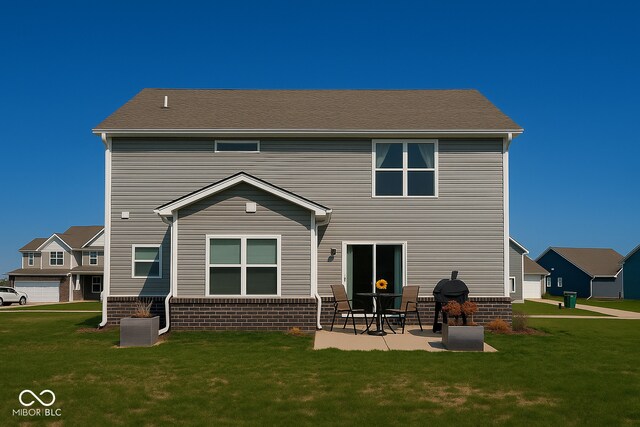 1573 Vera Blvd, Danville, IN 46122 - rear view of property featuring a patio area, a lawn, and brick siding