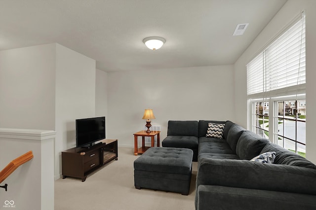 16758 Bingham Dr, Westfield, IN 46074 - living area featuring visible vents, baseboards, and light carpet