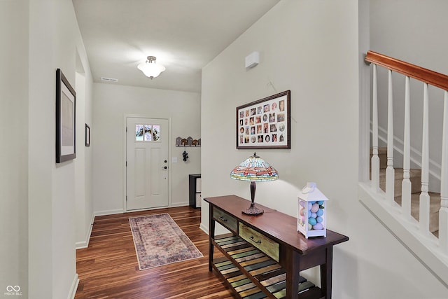 16758 Bingham Dr, Westfield, IN 46074 - foyer entrance featuring wood finished floors, baseboards, and stairs