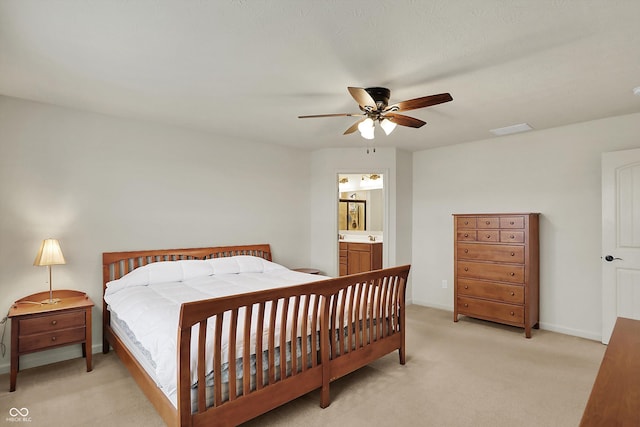 16758 Bingham Dr, Westfield, IN 46074 - bedroom featuring baseboards, connected bathroom, visible vents, ceiling fan, and light colored carpet