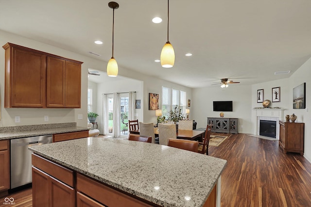 16758 Bingham Dr, Westfield, IN 46074 - kitchen with visible vents, dark wood-style flooring, open floor plan, a ceiling fan, and stainless steel dishwasher