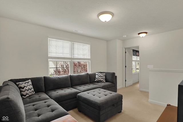 16758 Bingham Dr, Westfield, IN 46074 - living area featuring light colored carpet, baseboards, and visible vents