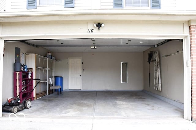 607 Deer Trail Dr, Indianapolis, IN 46217 - garage featuring driveway