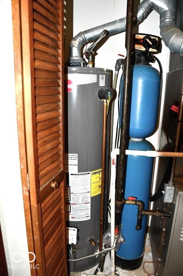 607 Deer Trail Dr, Indianapolis, IN 46217 - utility room featuring water heater