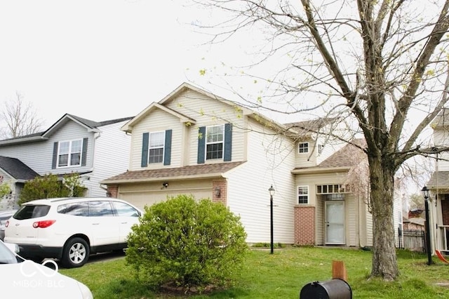 607 Deer Trail Dr, Indianapolis, IN 46217 - view of front of property with brick siding, a front yard, an attached garage, and fence