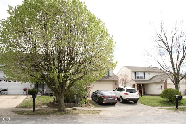 607 Deer Trail Dr, Indianapolis, IN 46217 - view of front of house featuring concrete driveway and a front yard