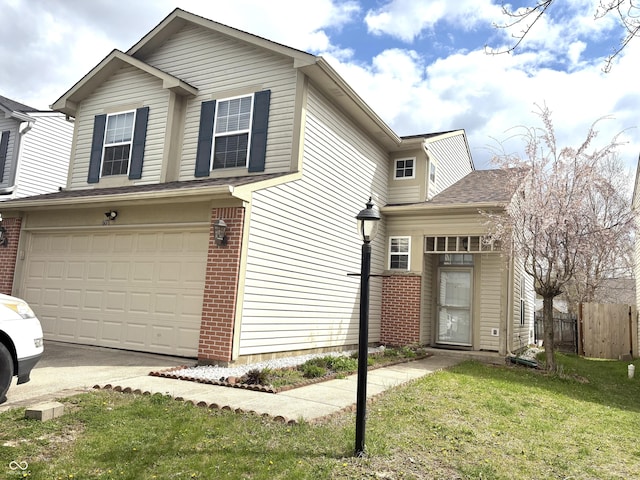 607 Deer Trail Dr, Indianapolis, IN 46217 - view of side of property with a lawn, fence, brick siding, an attached garage, and concrete driveway