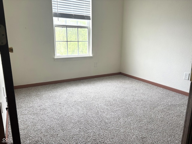 607 Deer Trail Dr, Indianapolis, IN 46217 - carpeted empty room featuring baseboards