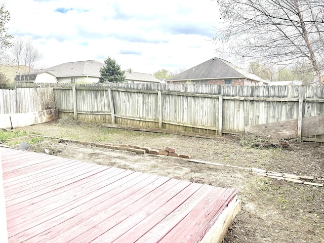 607 Deer Trail Dr, Indianapolis, IN 46217 - wooden deck featuring a fenced backyard