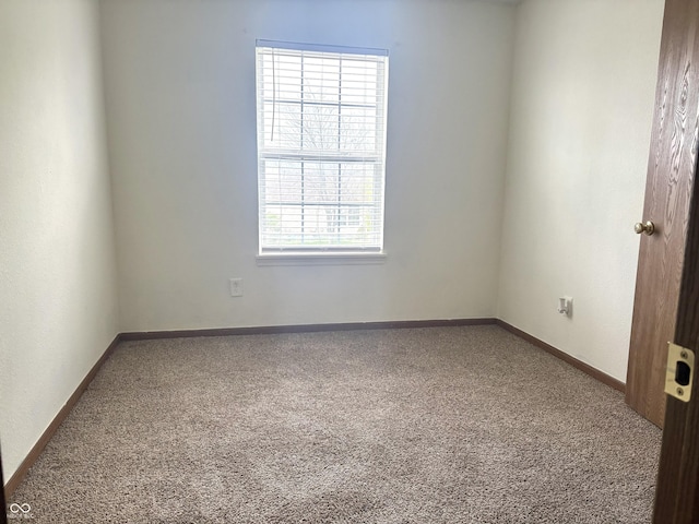 607 Deer Trail Dr, Indianapolis, IN 46217 - carpeted spare room featuring baseboards