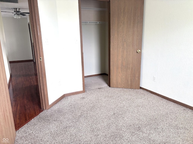 607 Deer Trail Dr, Indianapolis, IN 46217 - unfurnished bedroom featuring a closet, baseboards, carpet, and visible vents