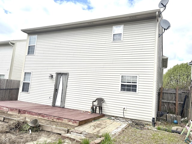 607 Deer Trail Dr, Indianapolis, IN 46217 - back of property with a deck and fence