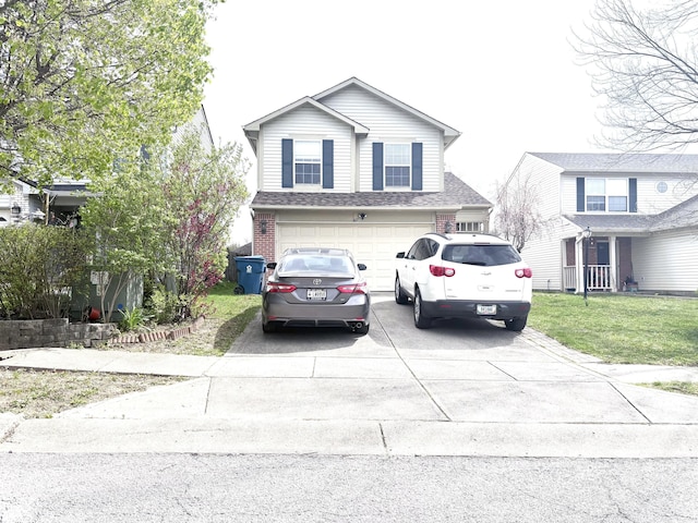 607 Deer Trail Dr, Indianapolis, IN 46217 - traditional-style house with concrete driveway, a front yard, brick siding, and a garage