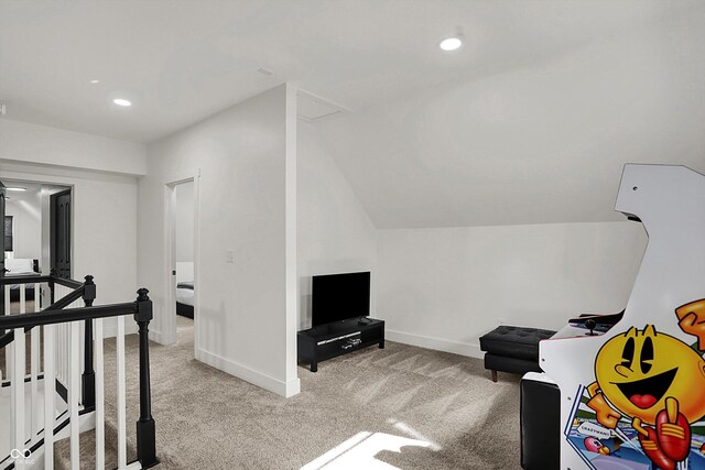 1818 Orleans St, Indianapolis, IN 46203 - interior space featuring vaulted ceiling, baseboards, carpet flooring, and recessed lighting