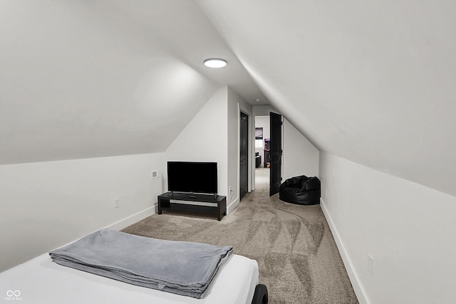 1818 Orleans St, Indianapolis, IN 46203 - bedroom featuring baseboards, carpet, and lofted ceiling