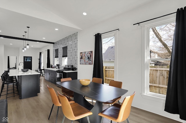 1818 Orleans St, Indianapolis, IN 46203 - dining area with recessed lighting, lofted ceiling, wood finished floors, and a wealth of natural light