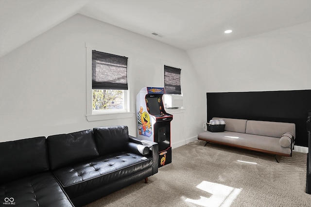 1818 Orleans St, Indianapolis, IN 46203 - carpeted living room with vaulted ceiling, recessed lighting, and visible vents