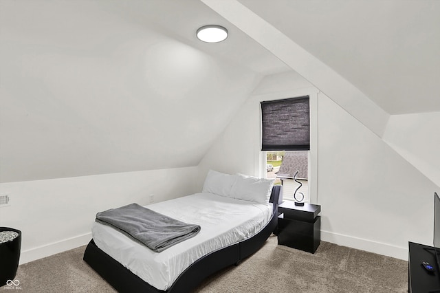 1818 Orleans St, Indianapolis, IN 46203 - carpeted bedroom with baseboards and vaulted ceiling