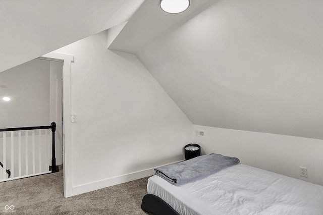 1818 Orleans St, Indianapolis, IN 46203 - carpeted bedroom featuring baseboards, visible vents, and lofted ceiling