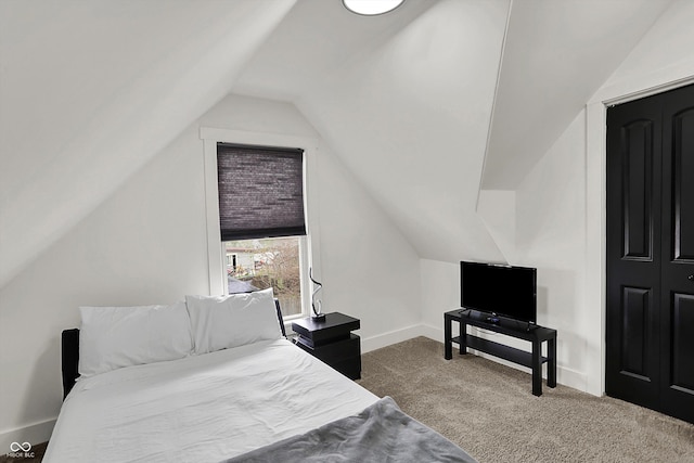 1818 Orleans St, Indianapolis, IN 46203 - bedroom featuring baseboards, carpet, and vaulted ceiling
