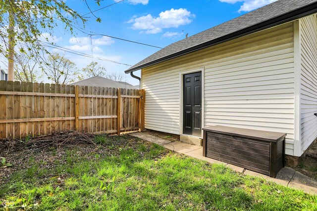 1818 Orleans St, Indianapolis, IN 46203 - back of property featuring roof with shingles and fence