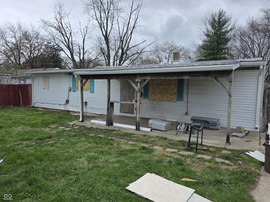 1830 S Chester Ave, Indianapolis, IN 46203 - back of house featuring fence and a yard