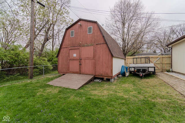 view of shed featuring a fenced backyard