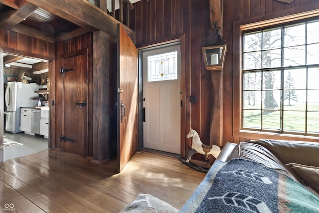 2790 W 50th St, Marion, IN 46953 - interior space featuring wooden walls, beam ceiling, and hardwood / wood-style floors