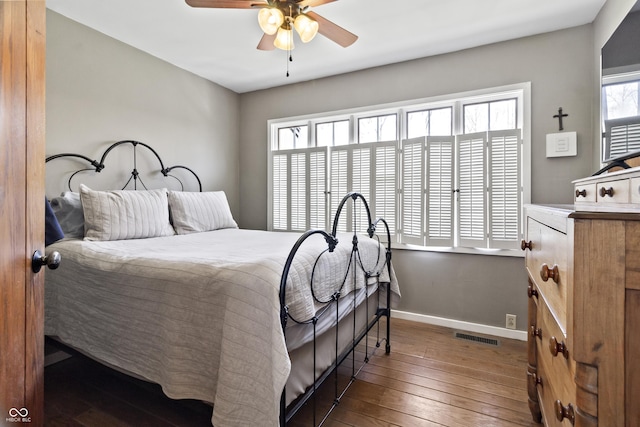 2790 W 50th St, Marion, IN 46953 - bedroom featuring baseboards, a ceiling fan, hardwood / wood-style flooring, and visible vents
