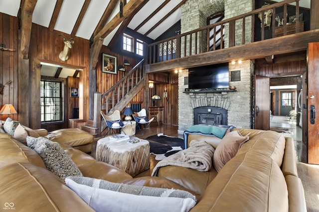 2790 W 50th St, Marion, IN 46953 - living room with wooden walls, high vaulted ceiling, stairs, and wood finished floors