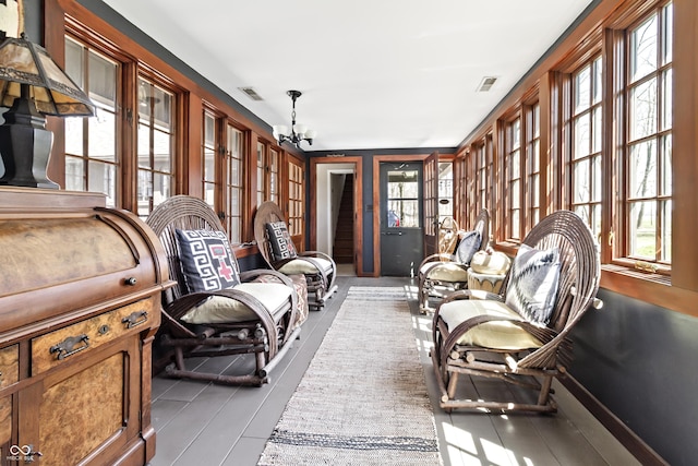 2790 W 50th St, Marion, IN 46953 - sunroom featuring visible vents and a notable chandelier