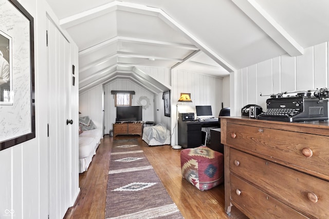 2790 W 50th St, Marion, IN 46953 - bedroom with beam ceiling, wood finished floors, and a decorative wall