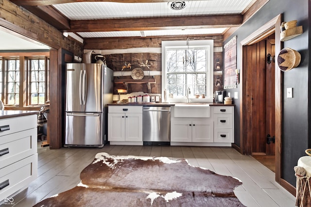 2790 W 50th St, Marion, IN 46953 - kitchen featuring a sink, beam ceiling, a wealth of natural light, and stainless steel appliances