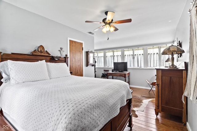2790 W 50th St, Marion, IN 46953 - bedroom with a ceiling fan, baseboards, visible vents, and dark wood finished floors