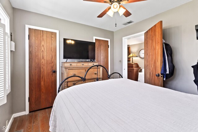 2790 W 50th St, Marion, IN 46953 - bedroom with a ceiling fan, baseboards, visible vents, and wood finished floors