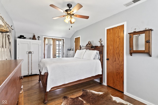 2790 W 50th St, Marion, IN 46953 - bedroom featuring visible vents, baseboards, lofted ceiling, and dark wood-style floors