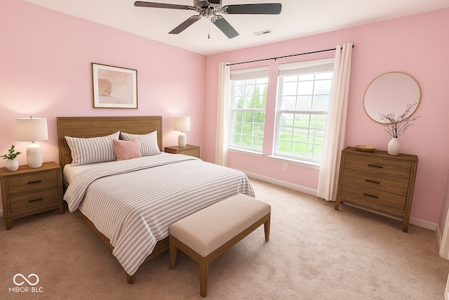 3724 Jonathan Rdg, Columbus, IN 47201 - bedroom featuring light carpet and a ceiling fan