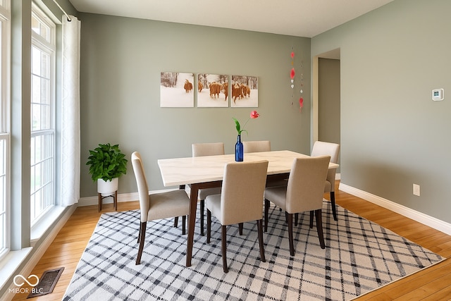 3724 Jonathan Rdg, Columbus, IN 47201 - dining area featuring light wood-style floors and plenty of natural light